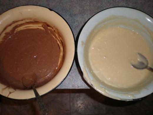 Then put one half of the dough into another bowl and mix it with spoon of cocoa