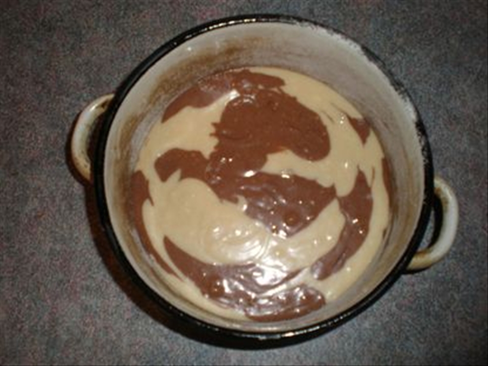 Put one tablespoon of the light dough and tablespoon of the dark