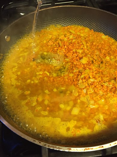 Dal - lentils soaking up all the goodness in the pan as it simmers.