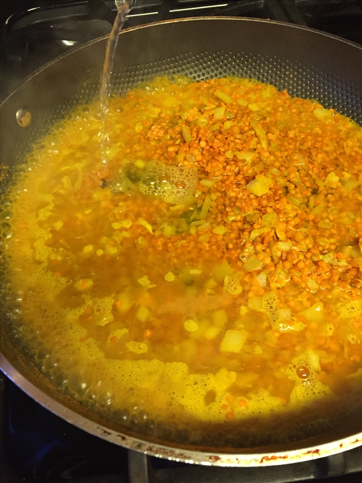 Dal - lentils soaking up all the goodness in the pan as it simmers.