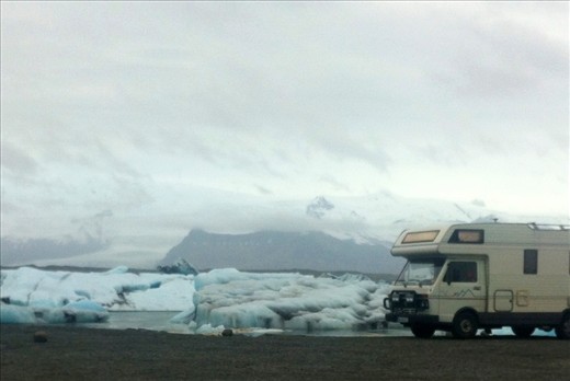 Reaching the biggest glacier in Europe is at first, a shock. To be face to face with such a monstrous and beautiful creature. You can almost feel it living and breathing on you. It feels like the only  living creature for miles. This camper had parked next  to a lake filled with calved icebergs and apparently spent the night in their company, and their company alone. 