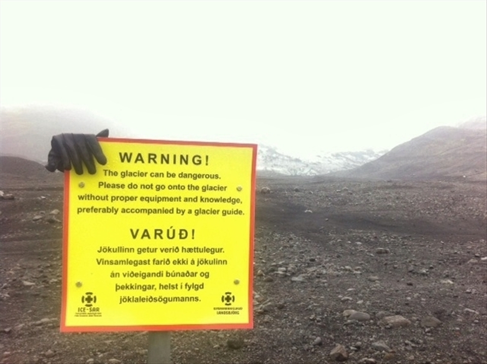 The strange, vast, lonely, emptiness of Iceland is sometimes interrupted by a strange sign of human life, resulting in a surreal image of nature subtly stamped by the footprint of mankind.The precariously placed single glove on top of this warning meant to discourage unattended glacier climbing is both humorous and creepy. Especially after speaking to locals who all seem to have a story to share about an over-confident tourist who went out exploring in  the land of fire and ice, to never be seen alive again.
