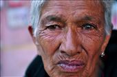 An elderly woman who has been financially supported by EPSA (Entire Power for Social Action) in Nepal poses for a photo in the streets of Kathmandu. This poor woman lives alone with no protection or security and continues to work and labour in order to survive.: by lachlanmcgarvie, Views[892]