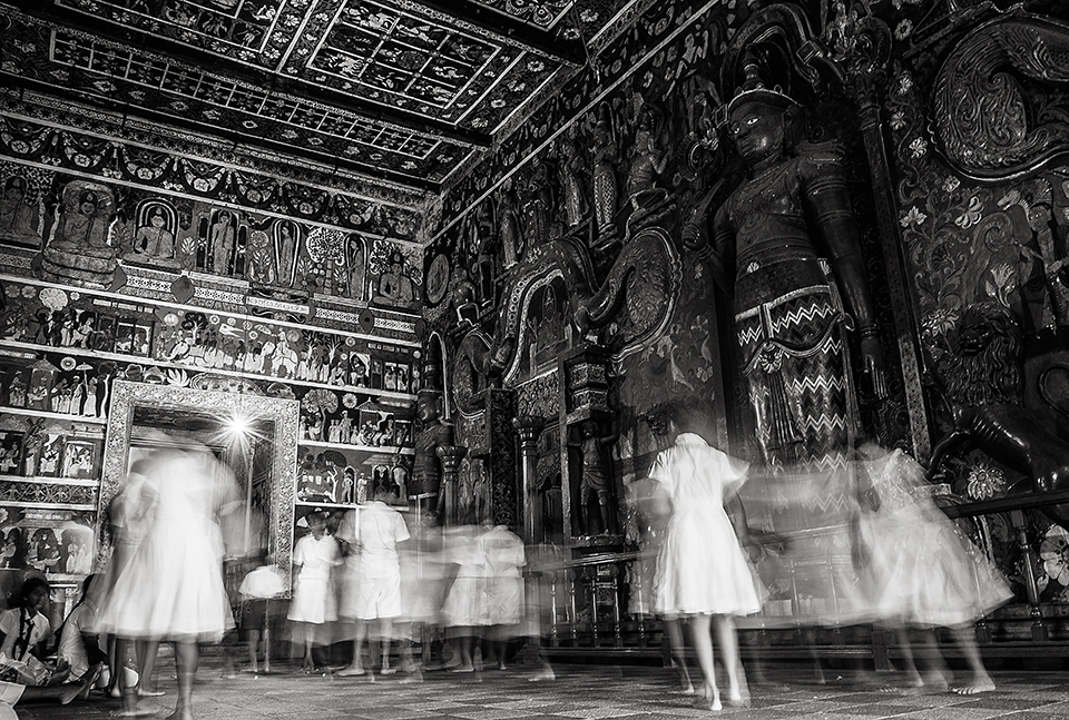 Witness to the Impermanence-
A poet calls “Kelaniya Temple” as a place that “never grows old, but every time gains in beauty..” It relates to the fact that, it has reborn from ashes each and every time. 1920’s paintings being the Latest and the most spectacular addition of them all…these become the backdrop, whilst articulating the fact that “In this impermanent world, what lives on is the spirit of the people….”