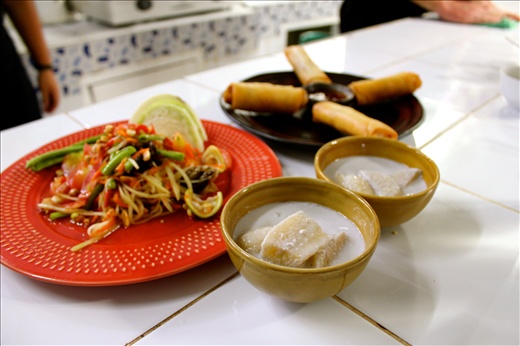 Our Thai cooking school feast! Som Tam, spring rolls and coconut banana dessert