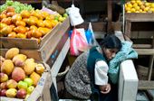 At four pm and nearing the end of the days sales, a woman uses the small space she has for a nap after a long day of work. San Pedro Markets, Cuzco, Peru.: by laramer, Views[395]