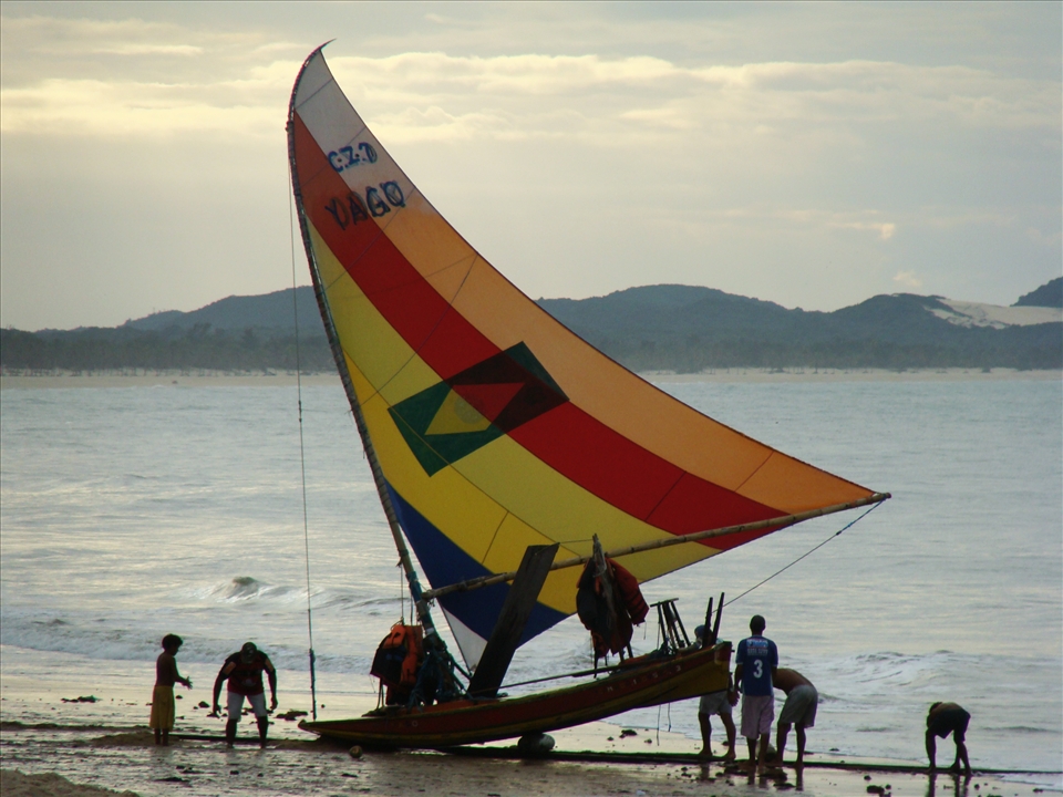 Fishers preparing their boat to go fishing in Ceará - North Brazil