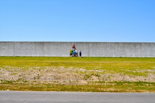 After the devistation of Hurricane Katrina I volenteered to help and fell in love with the city, its people and their stories. For the past four years I have returned to work on re-building efforts. This photograph is the result of another project we took on one day, 