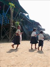 The dry season in Kampong Phluk exposes the 6 metre tall stilted structure of the village where children play on solid land.: by laurianryan, Views[579]