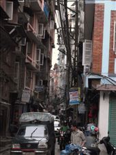 good example of the crazy narrow streets , choked with traffic, and no pavements anywhere!: by lazer, Views[213]