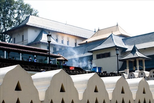 The Temple of the Scared Tooth Relic in Kandy, Sri Lanka which houses a tooth relic of the Buddha brought into the country in the 4th Century. Hundreds of devotees come to the Temple everyday to pray and venerate the Buddha.