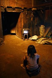 01-Cua is watching TV. She is one of the one million members counting Hmong ethnic minority in Vietnam.: by lena1982, Views[646]