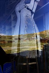 Dress shop, with the closed gold mine in the window reflection. : by leonore, Views[269]