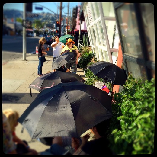 a bevy of black umbrellas, West Hollywood