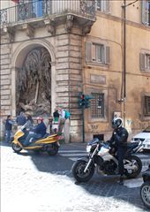 Practical versus Fashionable – a Roman Biking Dichotomy? 
As two riders wait at the lights the practical rider cannot help but glance across at the fashionable rider on his left, and the hero-like image he conveys on his superbike. Yet this rider does not look back at the practical rider. Fashion and image have high impact and influence in modern life today, and this aspect of human nature is portrayed in this photograph. : by life-on-bikes-in-rome, Views[378]