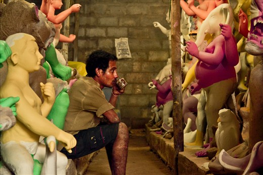 kolkata,making of durga idol..seemed like a human sitting in between gods