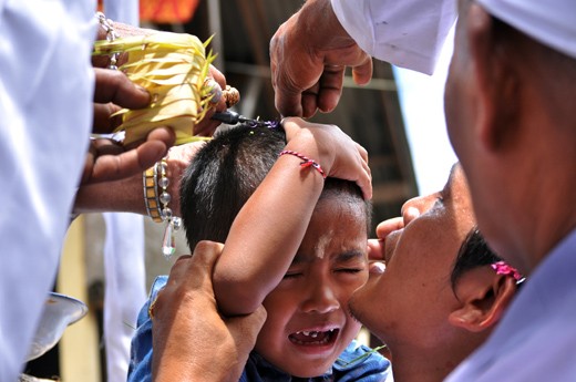 an act of discarding hair on young kids to cleanse Sad Ripu ( 6 darkness)