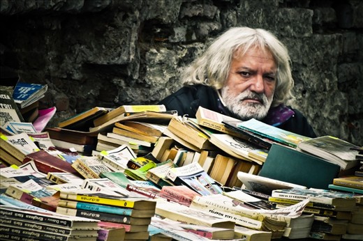 Old men that seems to belong to one of those books they were selling, like Dracula himself!