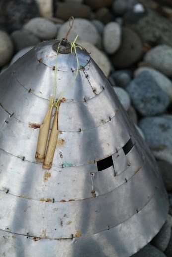 Before fishing for flying fish can begin, each village will have a traditional ceremony (招魚祭) to ensure good and safe fishing. The elder of the families will wear this helmet（銀盔） made from recycled tin cans or in some case silver coins to frighten away the evil ghosts that may endanger the fishermen or scare the flying fish away.