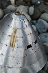 Before fishing for flying fish can begin, each village will have a traditional ceremony (招魚祭) to ensure good and safe fishing. The elder of the families will wear this helmet（銀盔） made from recycled tin cans or in some case silver coins to frighten away the evil ghosts that may endanger the fishermen or scare the flying fish away.: by limt, Views[487]