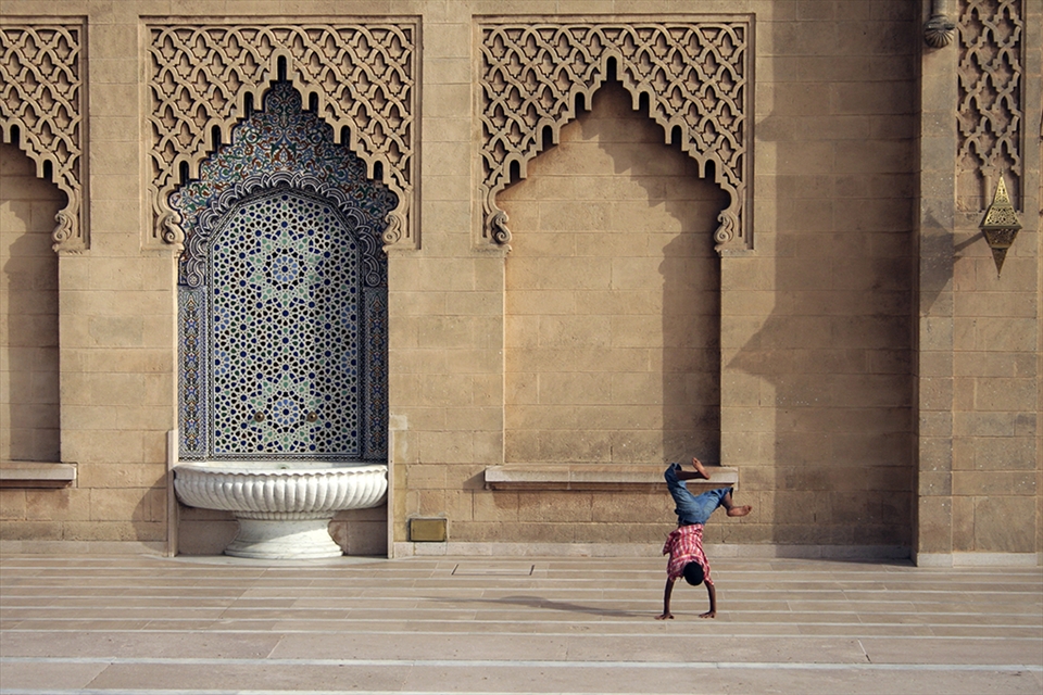 The kid found his playground near the Hasan Mosque in Rabat city