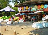 Chiang Mai, Thailand: a worker adjusts the display of handmade parasols. : by lindi_hall, Views[400]