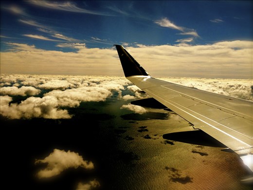 Perspective:  the endless sky and sea during a flight from New Jersey