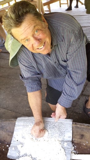 Uprooted a type of yucca, peeled and washed, grated(what I'm doing)