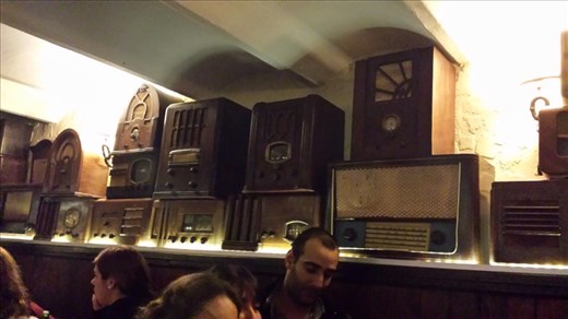 Montevideo restaurant, good food, old radios, people waiting for a table after midnight.