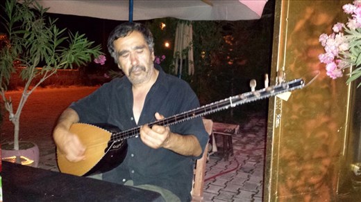 I was out to dinner at a four table restaurant and the only customer. Along with dinner I got a private concert from the restaurant owner. The instrument is called a SRZ. Beats me, it sounded good and it made for a memorable meal.