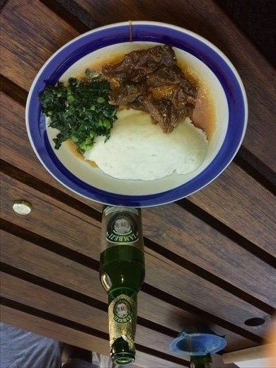 My lunch, all eaten without utensils, fingers only. It was good although a bit messy. Good deal three beers and lunch for five dollars.