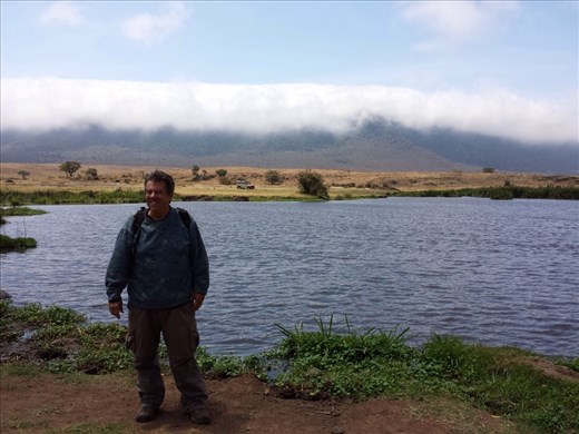 This lake is full of hippos, indescribable  wonder/beauty in the middle of the Ngorongoro  Crater. Those are clouds rolling over the top of the crater.