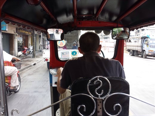 View from the back seat of a tuk-tuk