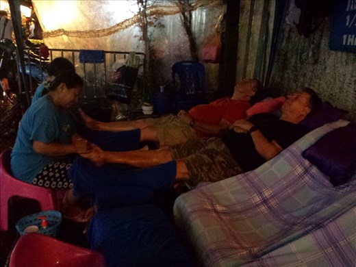 What a deal! Half hour foot massage for $4.00 US. It covers from about the knee down.