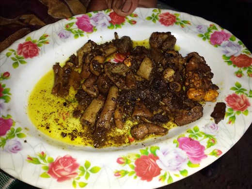 On the way back from the hot springs bike ride I stopped at two or three small stores/homes and had a beer at each one. The folks at one store gave me this plate of food as I drank my beer. I struggled to put down three bites. I'm guessing intestines of something? Enlarge photo and stare at it....... You can almost see it move.