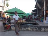 Merchant returning unsold produce at the end of the day.: by lipowcan8, Views[207]