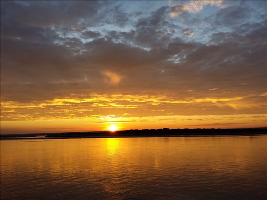 Picture taken at sunrise from a river boat traveling from Bagon to Hsipaw. 13 to 14 hour trip, very relaxing.