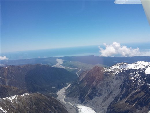 One of the only glaciers in the world  that the water runoff flows through a rainforest. The Tasman Sea in the distance.