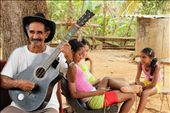 Old hands, playing music. Young hands, sending messages. Trinidad, Cuba.: by lisetta, Views[578]