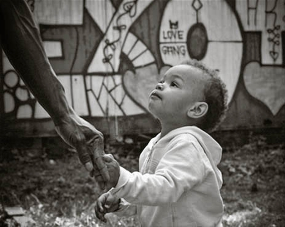 Junior and his father originally from Africa