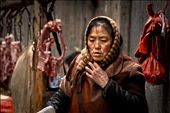 A butcher at a small improvised market in Hunan Province's Zhangjiajie, one of China's many cities with a population of over 1 million that is little-known outside of the country. : by littletrades, Views[969]