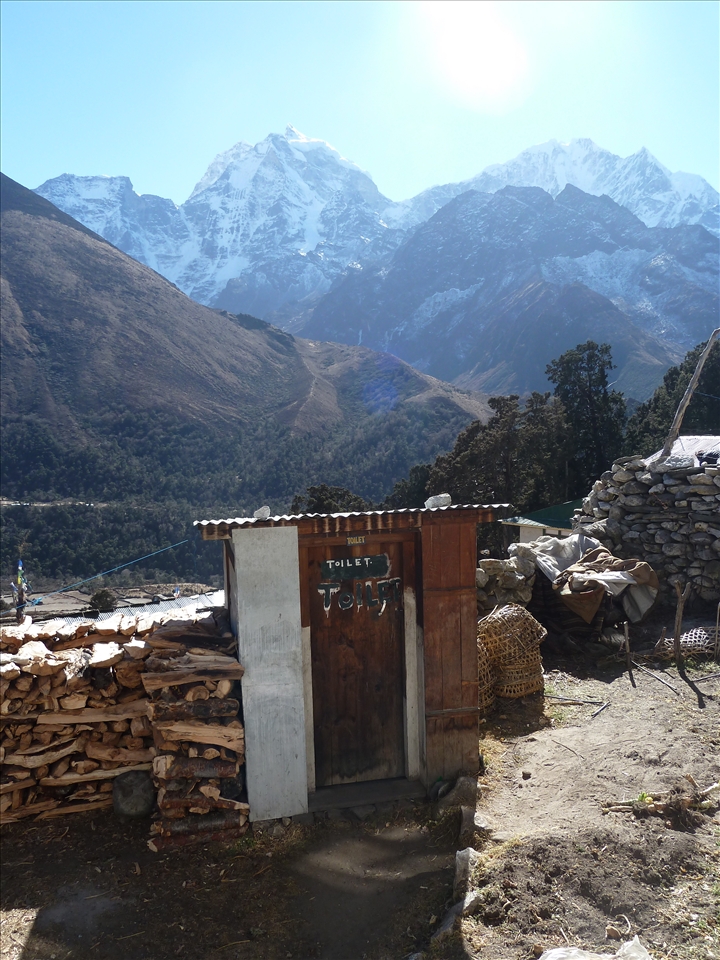 Loo with a View- one of the few enclosed toilets along the trek. You had to be careful when exiting that a) you didn't slip off the side of the mountain and b) there weren't any yaks to knock you down. This image tries to capture the simplicity of life on the mountain.