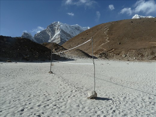 High Altitude Sports- A makeshift volleyball net at the foot of Everest Base Camp- this image tries to represent the 'normality' of life on the mountain through sport. Whether you are at sea level or 5000m high, sports play a huge role in any community. 