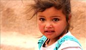 A young bedouin girl in Petra - her hair wild and her eyes teary due to the wind: by livetotravel, Views[268]