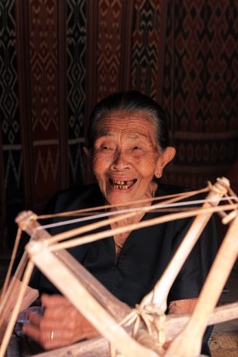 Meanwhile, an old woman next door selling cloth to pay her funeral later