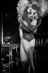 The audience sat on the edge of their seats, as the cabaret performer fluttered her feathers and blood began to pour from her lips. A very bizarre show. I had to edge closer and closer to the front of the stage to get a detailed shot of her stage makeup. Any fault in her confidence during the act did now show, until after when I met her backstage, petrified by the size of the crowd. : by lizziemay, Views[227]