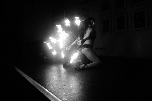 The girls all stand in a line, waiting to be called on stage to perform. They chat, smile and dance along to the music until it is time to step onto the oil-slicked floor. It is only herself in front of a club of intoxicated partygoers. 