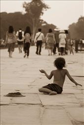 A despondent child begging for money in Siem Reap: by lltay, Views[263]