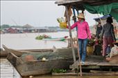 A fisher girl taking a break by the boats in Tonle Sap: by lltay, Views[223]