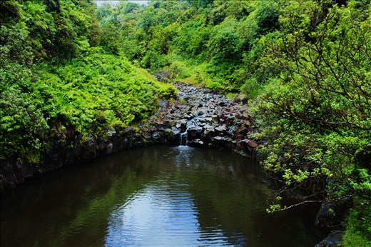 Rain runoff turning into a waterfall in the cliffs